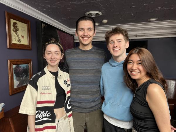 Four members of the Flood smiling.