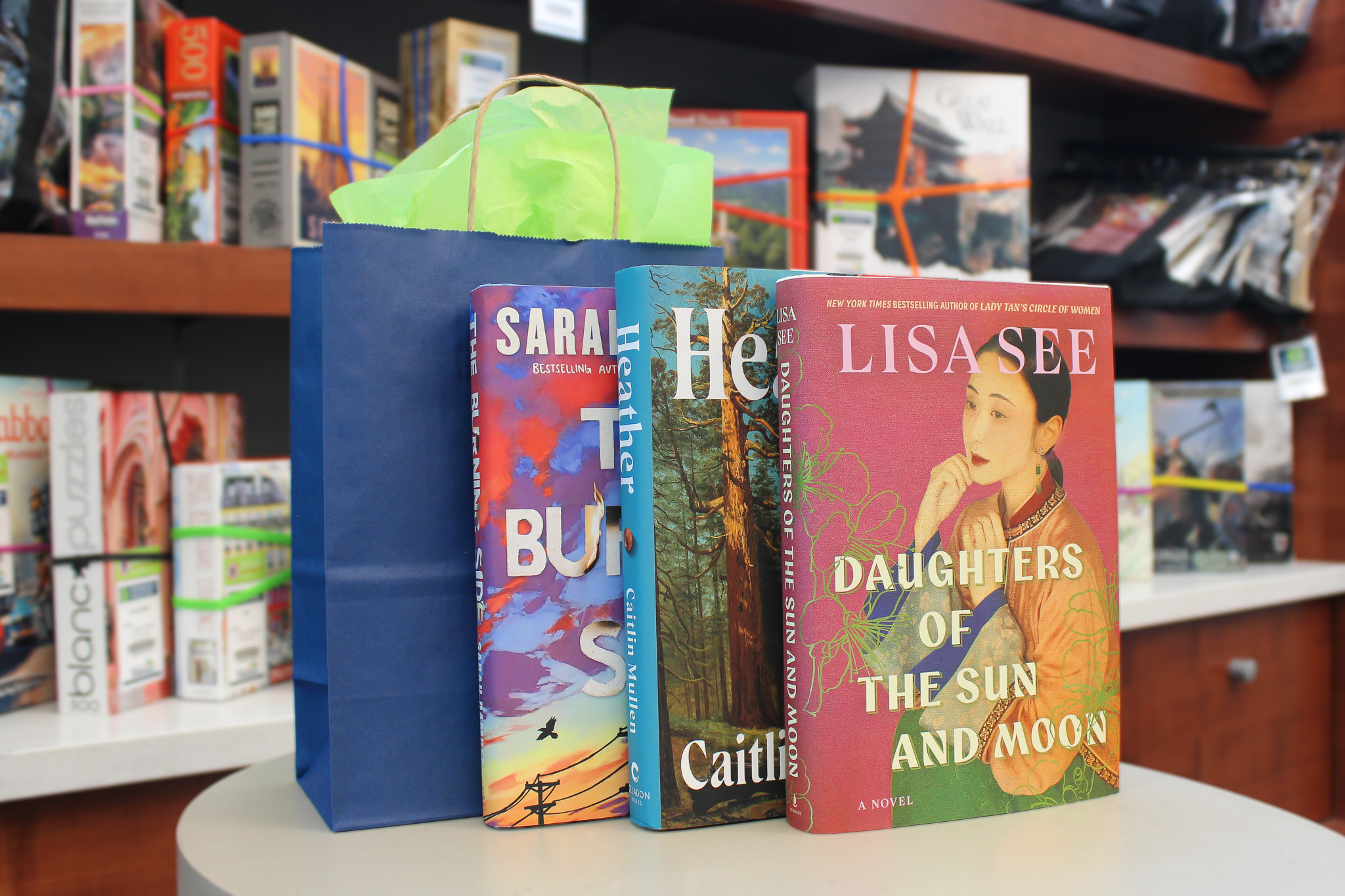 Three books and a gift bag.