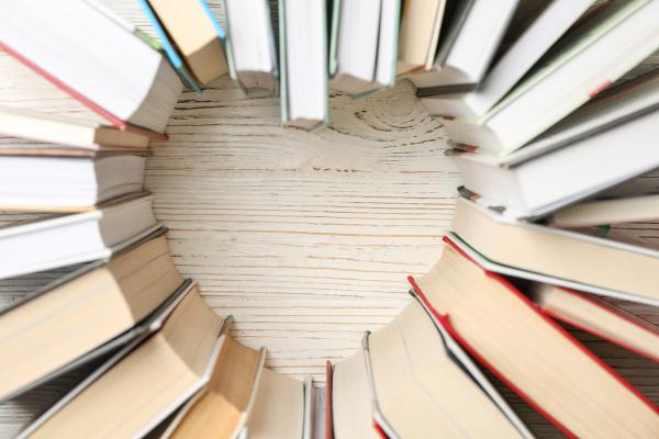 Books arranged in the shape of a heart.