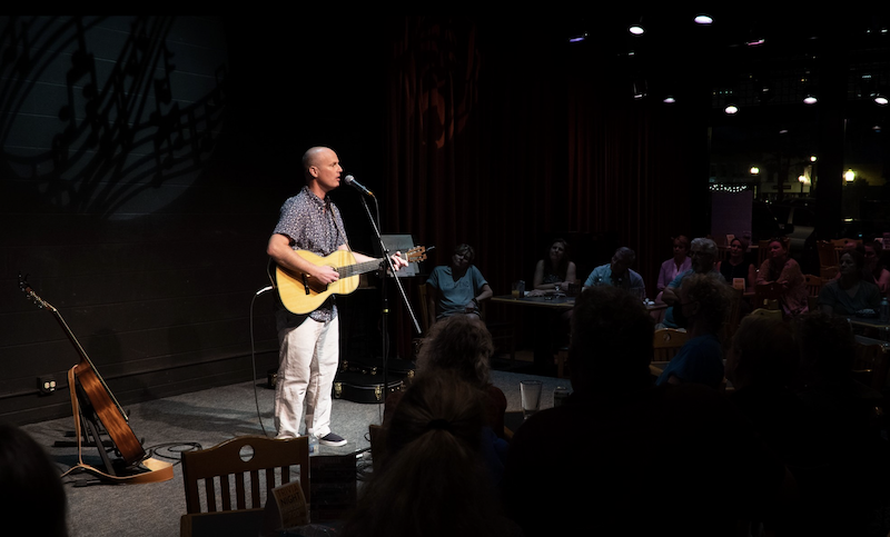 David Martin playing his guitar.