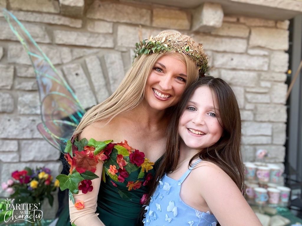 Garden fairy smiling with a child