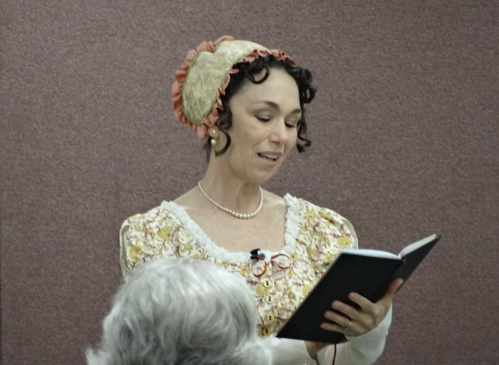 Debra Ann Miller dressed as Jane Austen.