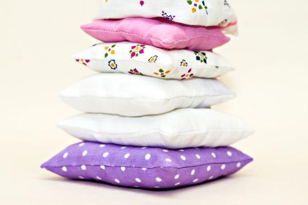 Stack of fabric pillows.