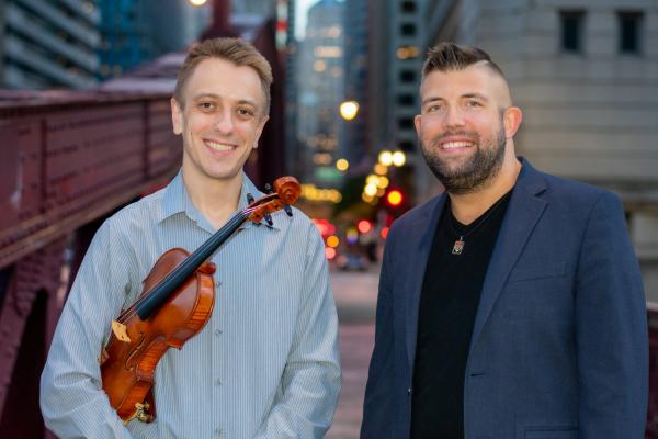 Brian and Steven posing on a Chicago bridge