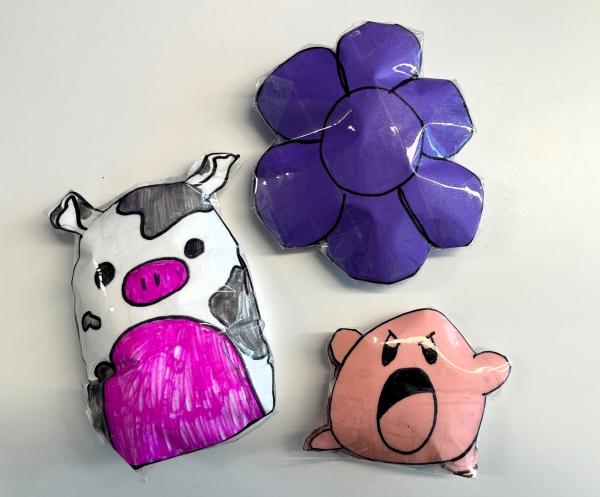 Cow, Kirby and flower paper squishies.