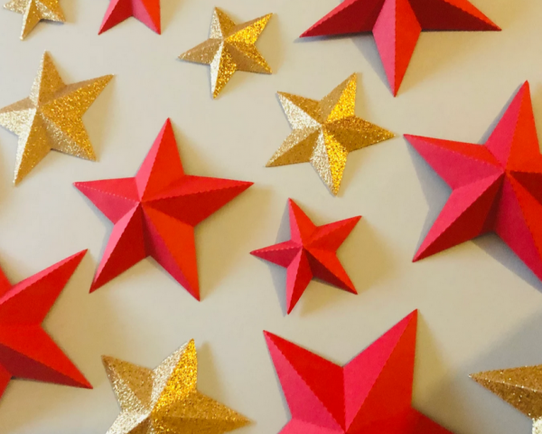 Red and Gold stars of various sizes.
